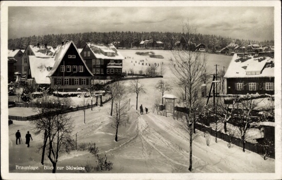 Postcard Braunlage in the Upper Harz, snowy landscape, view of ski meadow, houses, winter atmosphere