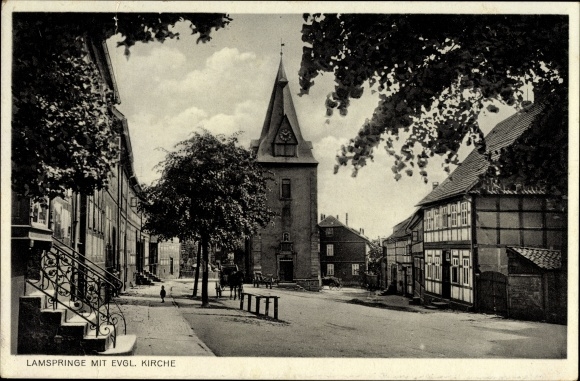 Postcard Lamspringe in Lower Saxony, street section with old houses and a protestant church
