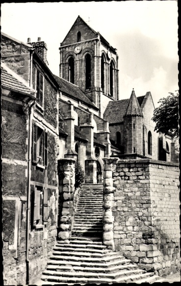 Ak Auvers sur Oise Val d'Oise, Kirche Notre Dame, Vue du bas des remparts