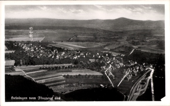 Postcard Heiningen in the Swabian Alb, aerial view of rural surroundings, buildings, fields, mountain