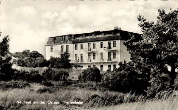 Postcard Neuhaus Dierhagen on the Baltic Sea, holiday home, building with trees, coastal landscape