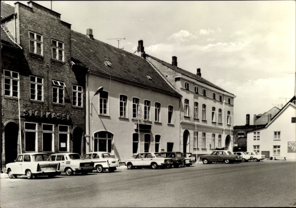 Postcard Krakow am See in the district of Rostock, market square, cars in front of the savings bank