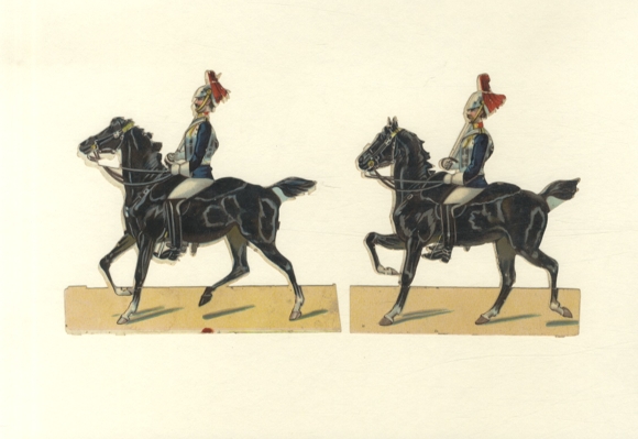 2 wafer soldiers in guard uniform on horses, each approx. 12 x 12.5 cm