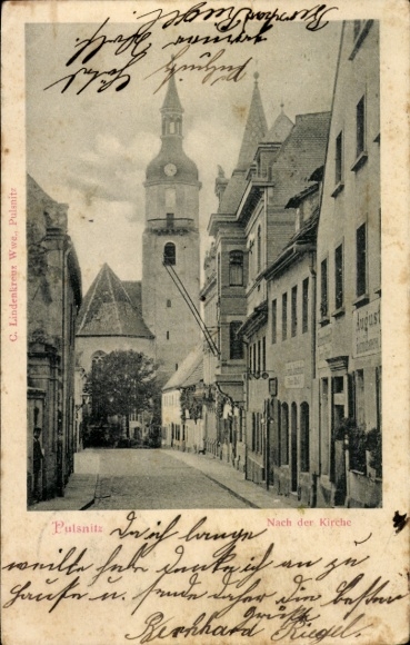Postcard Pulsnitz Saxony, street to the church, tower, houses, C. Lindenkreux Wwe.