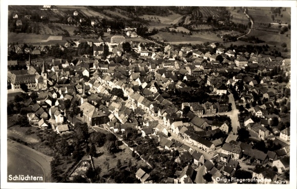 Postcard Schlüchtern in Hesse, aerial photograph of the place