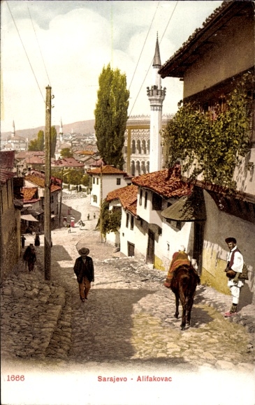 KP Sarajevo Bośnia i Hercegowina, ulica w Sarajewie z dwiema osobami, jedna z osłem.