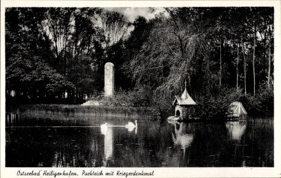Postcard Heiligenhafen, Baltic Sea resort, park pond with war memorial, swans