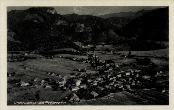 Postcard Unterwössen in Upper Bavaria, aerial photograph, mountain landscape, small village, buildings