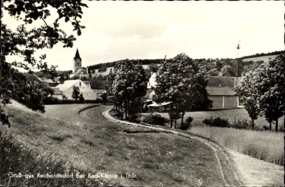Ak Reichardtsdorf Bad Köstritz in Thüringen, Landschaft mit Kirche, Häusern, Bäumen, Straße