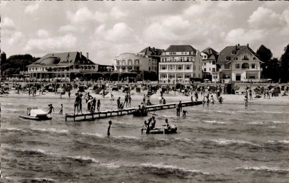 Ak Ostseebad Travemünde Lübeck, strand, zonaanbidders, zwemmers, gebouw, pier