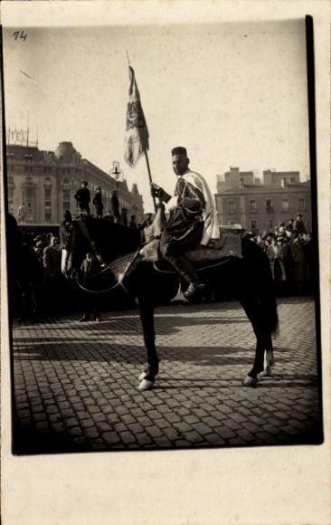 Photo Postcard Turkish? Soldier on horseback, square, festival, flag