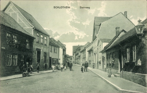 Postcard Schlotheim in Thuringia, city view, Steinweg, buildings, people on the street