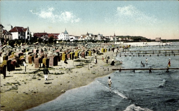 Postcard Seebad Binz on Rügen, beach with beach chairs, people at the water, row of coastal houses