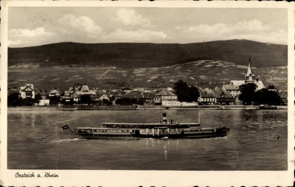 Ak Oestrich Winkel am Rhein Rheingau, Schiffsansicht, Rheinlandschaft, Kirche im Hintergrund,  