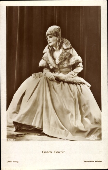 Postcard actress Greta Garbo, seated portrait, dress