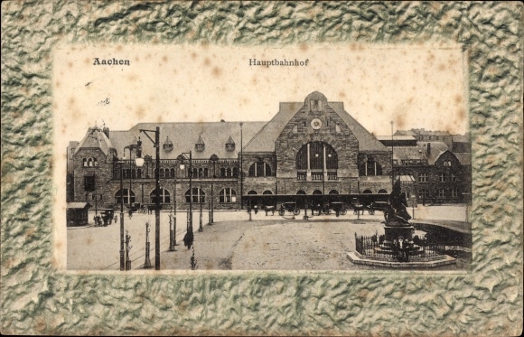 Präge Passepartout Ak Aachen in Nordrhein Westfalen, Blick auf den Hauptbahnhof, Denkmal