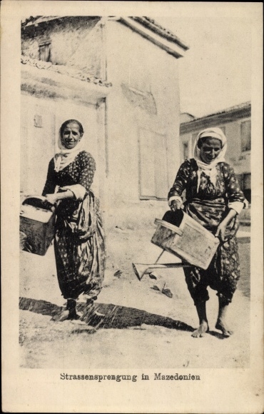 Postcard Macedonia, road demolition, women irrigate the road with watering cans