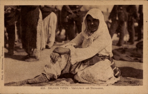 Postcard Balkan types, embroidery seller