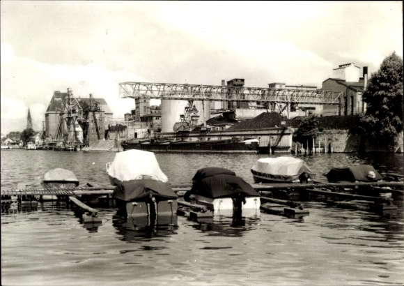 Picture of Wittenberge on the Elbe Prignitz, black and white photo, boats in the water, industry in the background