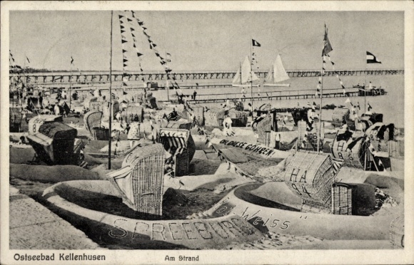 Postcard Ostseebad Kellenhusen in Holstein, beach, sand castles, flags