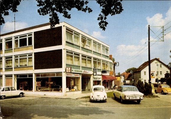 Postcard Uetze in Lower Saxony, EM cleaning, business district, cars parked in front of the building