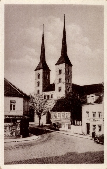 Ak Grimma Sachsen,Frauenkirche,Kolonialwaren K. F. Seifer,Klempner Gustav Martin