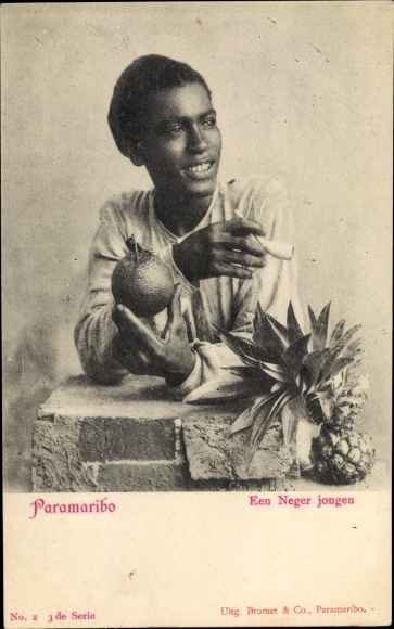 Postcard Paramaibo Suriname, Een negro jongen, man with a pipe