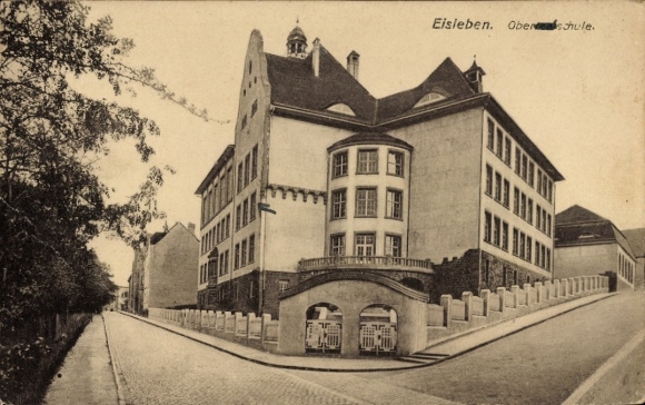 Postcard Lutherstadt Eisleben, high school, building, street, trees