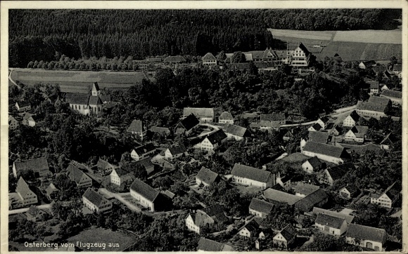Postcard Osterberg in Swabia, aerial view of village architecture, forest in the background