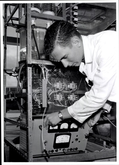 Photo Berlin, Bert Sass, researcher at an electrical measuring device