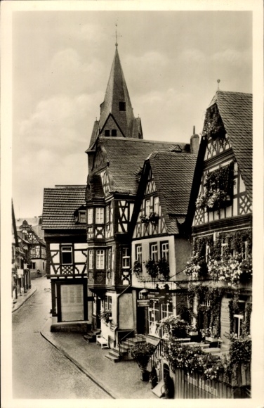 Postcard Idstein in Taunus Hessen, half-timbered houses with church