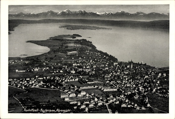 Ak Radolfzell am Bodensee, luchtfoto van Radolfzell, Bodenmeer, Alpen op de achtergrond
