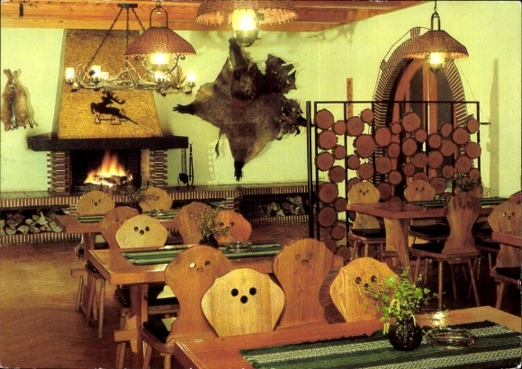 Ak Ostseebad Koserow auf Usedom, Gemütliches Restaurant, Kamin, Holzdesign, rustikale Einrichtung