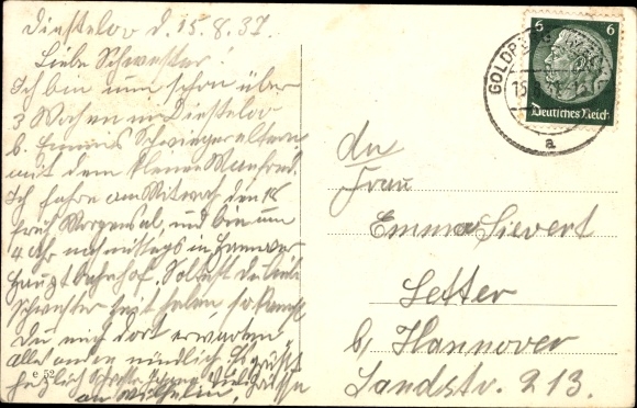 Postcard Goldberg in Mecklenburg, Adolf-Hitler-Strasse, war memorial, level crossing