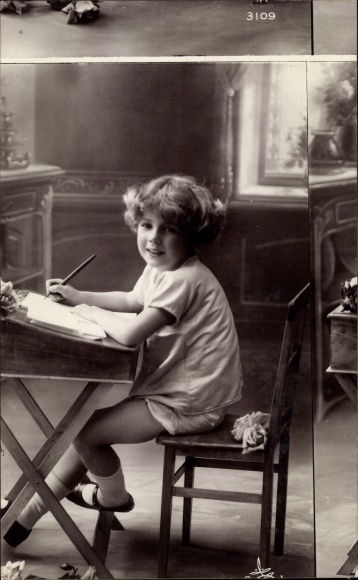 Postcard boy at the desk, misprint