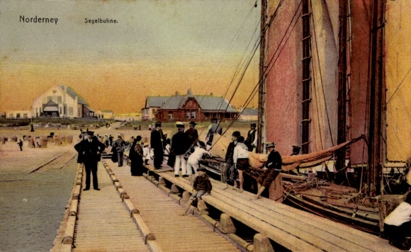 Postcard North Sea resort Norderney East Frisia, sailing stage, harbor view, sailing ships, people at the pier