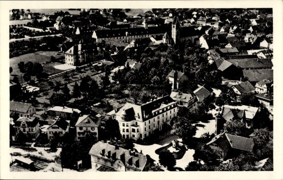 Postcard Bad Wörishofen in Unterallgäu, aerial view of many buildings, trees and streets, black and white