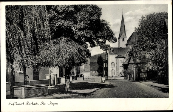 PC Burbach Kreis Siegen, street section, fountain, church tower