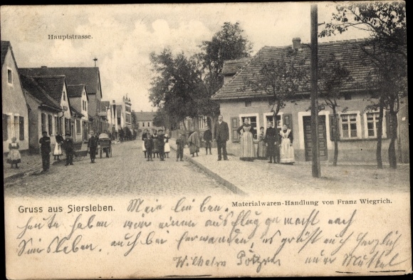 Postcard Siersleben Gerbstedt, main street, material goods store Franz Wiegrich, resident