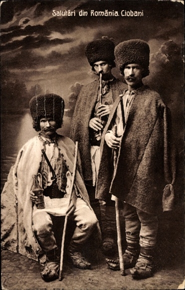 Postcard Romanian shepherds in traditional costume