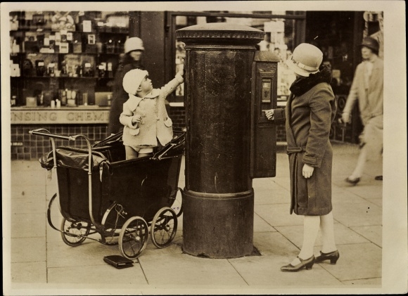 Photo London City, postage stamp machine at mailbox, pram