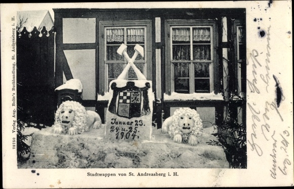 Coat of arms PC Sankt Andreasberg Braunlage in the Upper Harz, city coat of arms made of snow, house with garden