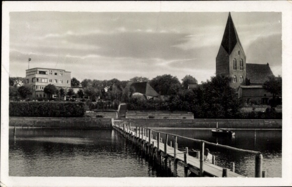 Ak Ostseebad Rerik in de wijk Rostock, kuurhuis en kerk, steiger aan het meer
