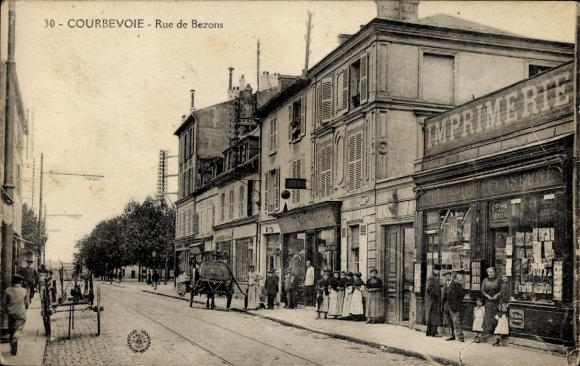 Postcard Courbevoie Hauts de Seine, Rue de Bezons, Imprimerie, building and street, historical view