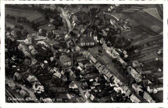 Postcard Grünhain in the Ore Mountains Saxony, aerial view of the village