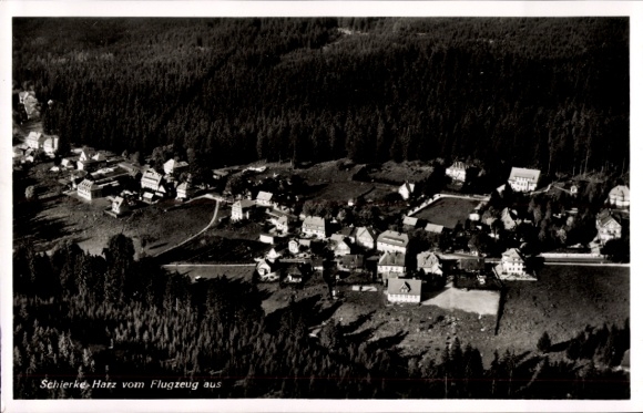 Postcard Schierke Wernigerode in the Harz Mountains, aerial view of numerous houses, forest in the background