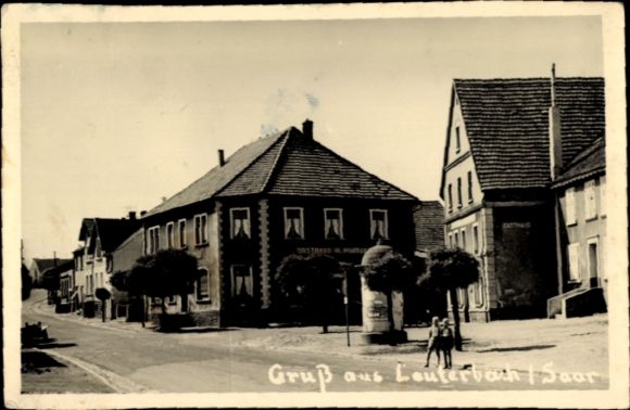 Foto Ak Lauterbach Völklingen im Saarland, Straßenpartie, Litfaßsäule