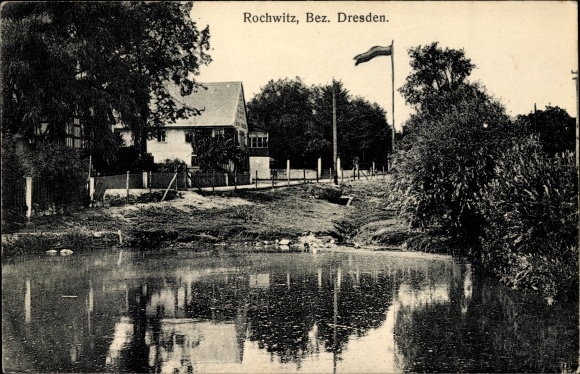 PC Dresden Northeast Rochwitz, lot at a pond, flag, building