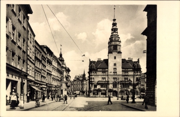 Ak Opava Troppau Region Mährisch Schlesien, Stadtansicht, Gebäude mit Turm, Straßenleben, Schwarz