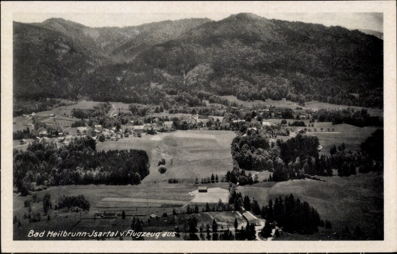 Postcard Bad Heilbrunn in Upper Bavaria, aerial photograph wide landscape view, mountains in the background